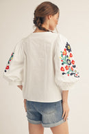 Embroidered Notched V-Neck Top