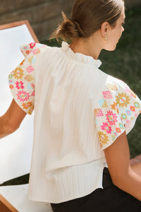 Embroidered Flutter Ruffle Sleeve Top