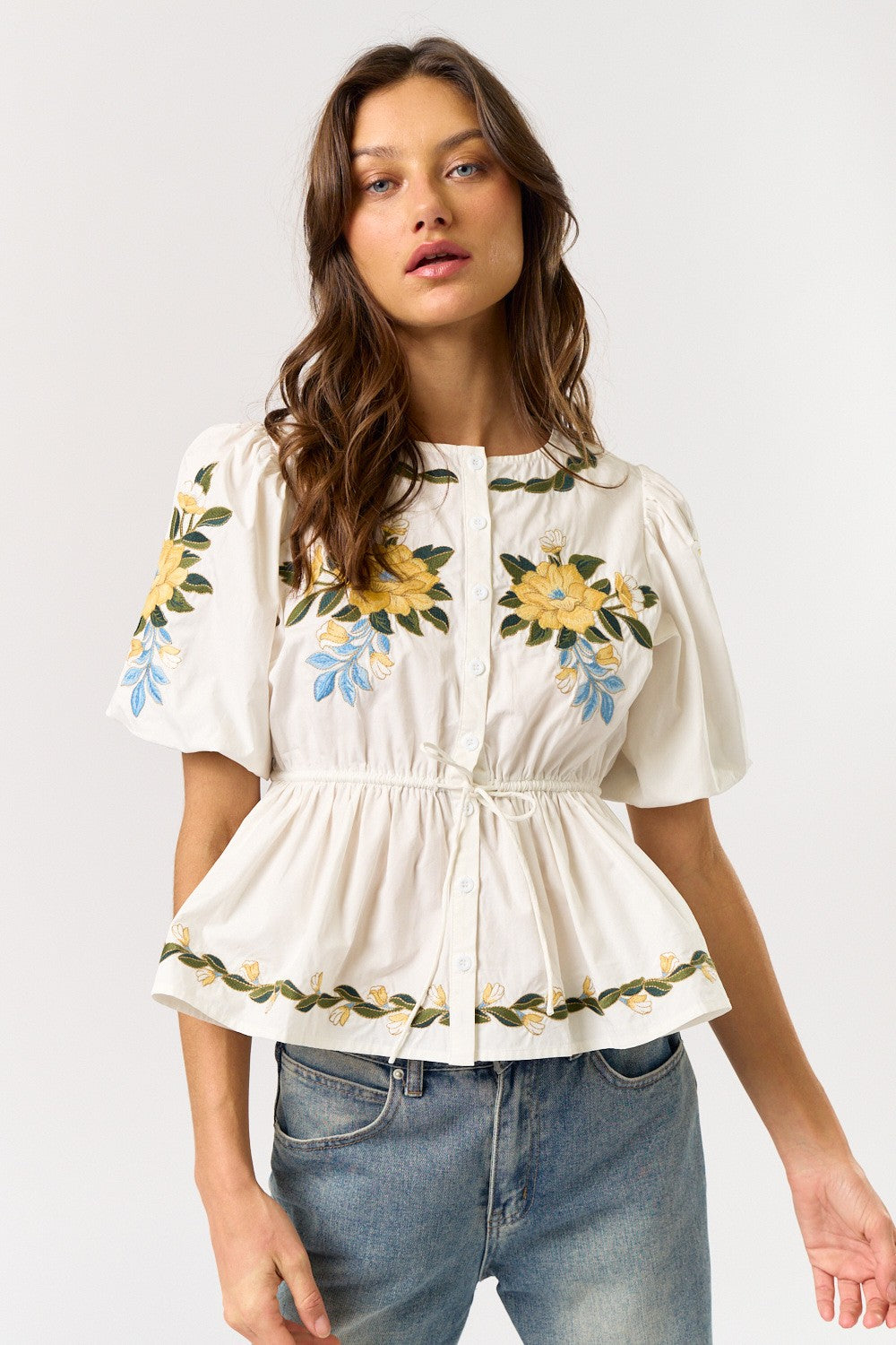 Embroidered Peplum Top