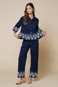 Embroidered Hem Peplum Blouse