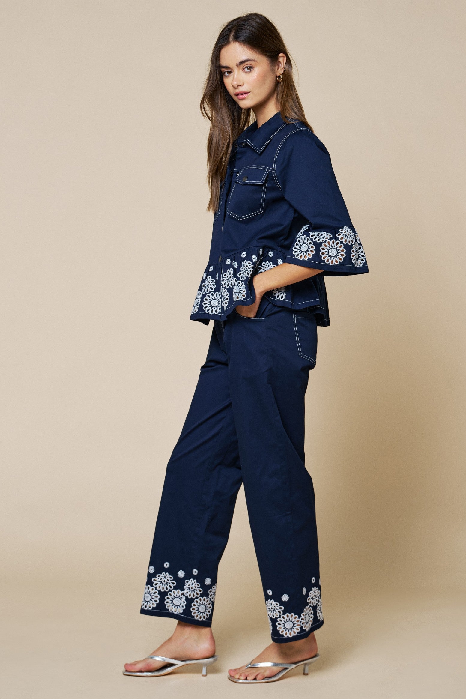 Embroidered Hem Peplum Blouse