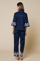 Embroidered Hem Peplum Blouse