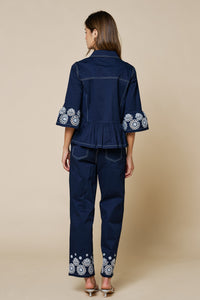 Embroidered Hem Peplum Blouse