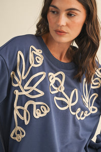 Cord Embroidered Sweatshirt